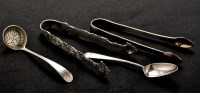 Lot 597 - A pair of George III sugar tongs, by John Fox...