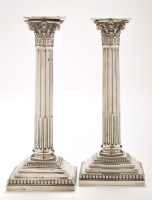 Lot 612 - A pair of Victorian candlesticks, by...