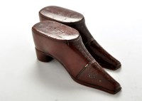 Lot 646 - Two 19th Century carved treen shoe snuff boxes,...