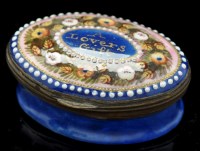 Lot 680 - A Georgian enamel patch box, oval, with...