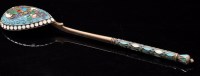 Lot 694 - A Russian silver gilt and enamel spoon, bears...