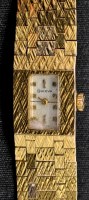 Lot 722 - Bulova: a lady's 1960's 9ct. gold wristwatch,...