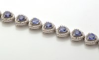 Lot 743 - A tanzanite and diamond set bracelet, the...