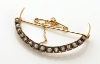 Lot 751 - A Victorian diamond set crescent brooch, the...