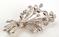 Lot 758 - A diamond floral spray pattern brooch, set...