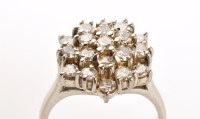 Lot 764 - A diamond cluster ring, the three-tier cluster...