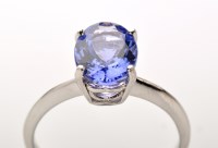 Lot 765 - A single stone tanzanite ring, the oval facet...