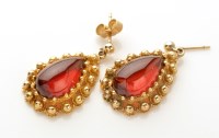 Lot 770 - A pair of garnet and yellow metal drop...