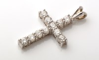 Lot 794 - A diamond set crucifix pendant, the brilliant...