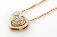 Lot 805 - A 14ct. gold diamond set heart pattern pendant,...