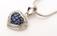 Lot 809 - A sapphire and diamond set heart-shaped...