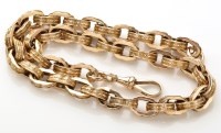 Lot 817 - A Victorian yellow metal chain of shaped oval...