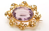 Lot 821 - An amethyst, seed pearl and yellow metal...