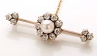 Lot 829 - A diamond and pearl bar brooch, the central...