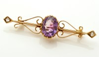 Lot 835 - An Edwardian amethyst, diamond and yellow...