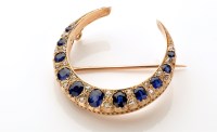 Lot 836 - A Victorian sapphire and diamond crescent...