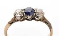 Lot 840 - A sapphire and diamond ring, the circular...