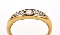 Lot 841 - A five stone diamond ring, the graduated...