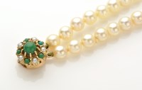 Lot 851 - A two row cultured pearl necklace, strung to a...