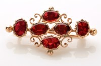 Lot 852 - A mid Victorian red glass and yellow metal...