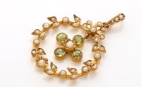 Lot 862 - An Edwardian peridot and seed pearl pendant,...