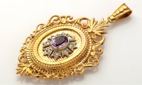 Lot 864 - A 9ct. yellow gold, amethyst and diamond...