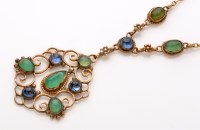 Lot 867 - A yellow metal, blue stone and jadeite...