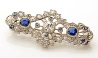 Lot 868 - An Art Deco diamond and sapphire brooch, the...