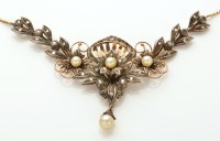 Lot 886 - An Edwardian cultured pearl and diamond set...