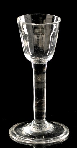 Lot 943 - Plain stem wine glass, the round funnel bowl...