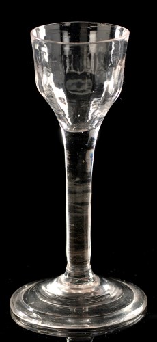 Lot 944 - Plain stem wine glass, the ogee bowl with...