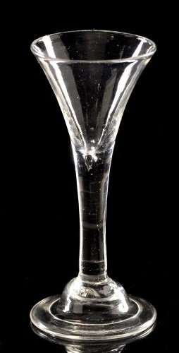 Lot 953 - Drawn plain stem wine glass, the drawn trumpet...