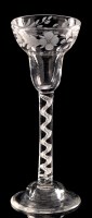 Lot 972 - Engraved air-twist wine glass, the round...