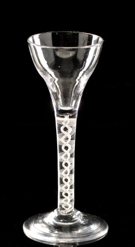 Lot 977 - Opaque twist wine glass, the pan-top trumpet...