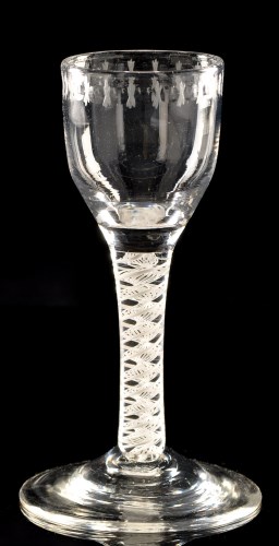 Lot 1001 - Engraved opaque twist wine glass, the ogee...