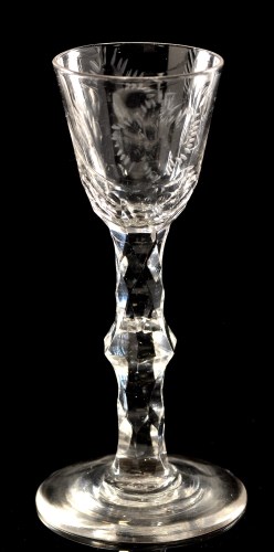 Lot 1010 - Cut faceted stem wine glass, the round funnel...