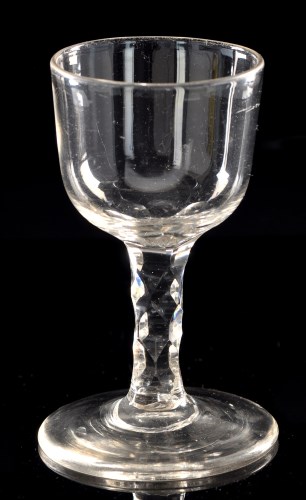 Lot 1013 - Faceted stem wine glass, the ogee bowl on...