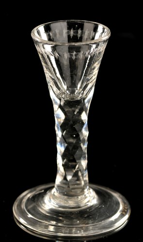 Lot 1016 - Engraved faceted stem short cordial glass, the...