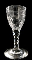 Lot 1020 - Faceted stem cut wine glass, the ovoid bowl...