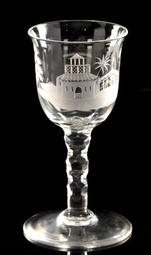 Lot 1022 - Engraved faceted stem wine glass, the wide...