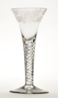 Lot 1031 - Engraved air-twist wine glass, the trumpet...