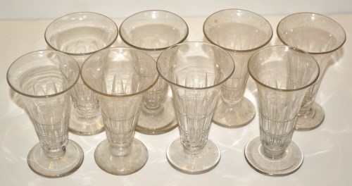 Lot 1044 - Eight syllabub glasses, with trumpet shaped...