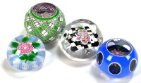 Lot 1065 - Four glass paperweights by John Deacons,...