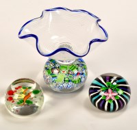 Lot 1067 - Two glass paperweights by John Deacons, and...