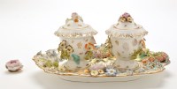 Lot 1112 - Bone china desk stand, with twin urn shaped...