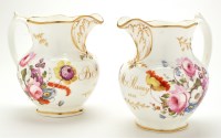 Lot 1119 - Pair of bone china water jugs, sides painted...