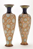 Lot 1140 - Pair of Royal Doulton stoneware vases, of...