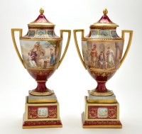 Lot 1199 - Pair of red ground Vienna urn shaped vases...