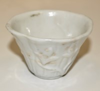 Lot 1218 - Blanc-de-chine Libation cup, of typical form,...