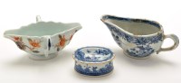 Lot 1232 - Chinese sauce boat, with twin handles and...